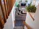 View of the living room from the upper level with a large sectional and decor at 20391 E 42Nd Ave, Denver, CO 80249