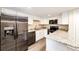 Bright kitchen with stainless steel appliances, and granite countertops at 17004 E Tennessee Dr # 212, Aurora, CO 80017