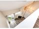 An aerial view of the living room with a fireplace, and sliding glass doors to the outside at 17004 E Tennessee Dr # 212, Aurora, CO 80017