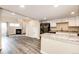 View of the living room and kitchen with granite countertops at 17004 E Tennessee Dr # 212, Aurora, CO 80017