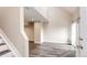 Bright living room with neutral paint, wood-style flooring and a vaulted ceiling at 17004 E Tennessee Dr # 212, Aurora, CO 80017
