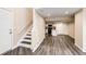 View of the living room and kitchen with wood-style floors at 17004 E Tennessee Dr # 212, Aurora, CO 80017