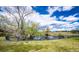 Scenic community pond bordered by lush greenery, with a peaceful and serene atmosphere at 17004 E Tennessee Dr # 212, Aurora, CO 80017