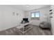 Bedroom featuring a desk setup, a chair, and a window with a view at 12017 W 54Th Dr, Arvada, CO 80002