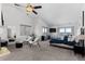 Main bedroom with vaulted ceilings, plush carpet, and a sliding door to the outside at 12017 W 54Th Dr, Arvada, CO 80002