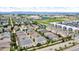 Aerial view showcases a community with a variety of home styles and landscaping at 3372 Central Park Blvd, Denver, CO 80238