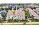 Bird's-eye view of homes with tile roofs and lush lawns at 3372 Central Park Blvd, Denver, CO 80238