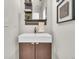 Stylish bathroom features modern vanity, decorative mirror, and elegant fixtures at 3372 Central Park Blvd, Denver, CO 80238