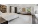 Comfortable bedroom featuring lots of natural light, a small seating area, and neutral decor at 10 Cherry St, Denver, CO 80220