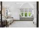 Bright bedroom featuring a cozy window seat with lots of natural light, and neutral decor at 10 Cherry St, Denver, CO 80220