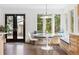 Cozy breakfast nook with a built-in banquette and views to the backyard at 10 Cherry St, Denver, CO 80220