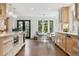 Bright kitchen boasting modern appliances, light wood cabinets, and an eat-in breakfast nook with lots of natural light at 10 Cherry St, Denver, CO 80220