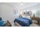 Bedroom with a double closet and window at 45008 Sunflower Ln, Bennett, CO 80102