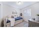 Bedroom with a daybed, window seating and closet at 45008 Sunflower Ln, Bennett, CO 80102