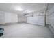 Attached garage with automatic opener and ample storage space at 45008 Sunflower Ln, Bennett, CO 80102