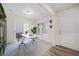 Bright home office features built-in shelving and sliding door access to the backyard at 45008 Sunflower Ln, Bennett, CO 80102