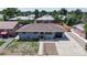 An aerial view of the house, showcasing its single-story layout and surrounding neighborhood at 235 N 12Th Ave, Brighton, CO 80601