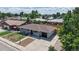 An aerial view of the home, showcasing its layout and surrounding neighborhood at 235 N 12Th Ave, Brighton, CO 80601