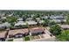 Aerial view of a residential neighborhood featuring well-maintained homes and mature trees at 235 N 12Th Ave, Brighton, CO 80601