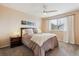 Bedroom suite featuring neutral tones, plush carpet and furniture at 7141 Red Mesa Dr, Littleton, CO 80125