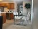 Bright kitchen with stainless steel appliances and wood cabinets at 1496 S Pierson St # 116, Denver, CO 80232