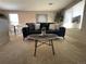 Inviting living room showcases stylish furniture, natural light, and a comfortable seating arrangement at 1496 S Pierson St # 116, Denver, CO 80232