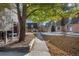 Pleasant neighborhood walkway leading to inviting condominium homes and well maintained grounds at 1496 S Pierson St # 116, Denver, CO 80232