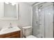 Basement bathroom with a shower and updated vanity at 1104 Elmer Dr, Northglenn, CO 80233