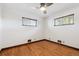 Well lit bedroom with hardwood floors and great natural light at 1104 Elmer Dr, Northglenn, CO 80233