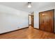 Bright bedroom with hardwood floors and double doors at 1104 Elmer Dr, Northglenn, CO 80233