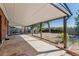 Covered patio overlooking the backyard at 1104 Elmer Dr, Northglenn, CO 80233