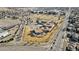 Aerial view of a school complex, showcasing multiple buildings and sports fields at 1973 Alton St, Aurora, CO 80010