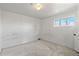 This bedroom has carpet floors and a window that provides plenty of natural light at 1973 Alton St, Aurora, CO 80010