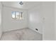 This bedroom features carpet floors and a window that provides plenty of natural light at 1973 Alton St, Aurora, CO 80010