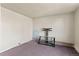 This living room has carpet floors and a brick fireplace at 1973 Alton St, Aurora, CO 80010