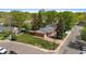 Overhead view of home with a garage, spacious backyard, and lush landscaping in a peaceful neighborhood at 6025 Johnson Way, Arvada, CO 80004