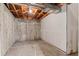 Unfinished basement with concrete walls and exposed ceiling, ready for customization at 6025 Johnson Way, Arvada, CO 80004