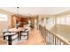 Modern kitchen features a spacious island, stainless steel appliances, and an adjacent dining area at 2940 Ulster St, Denver, CO 80238