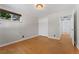 Bedroom features hardwood floors, closet, and natural lighting at 2692 S Pennsylvania St, Denver, CO 80210
