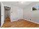 Bedroom with hardwood floors, closet and window at 2692 S Pennsylvania St, Denver, CO 80210