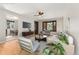 Inviting living room with hardwood floors, large bay window, and contemporary furniture at 2692 S Pennsylvania St, Denver, CO 80210