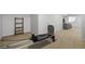 Basement space with a pilates machine and carpeted floors at 12119 S Wanderlust Way, Parker, CO 80138