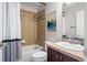 Bathroom featuring a shower over bath and stylish mirror at 12119 S Wanderlust Way, Parker, CO 80138