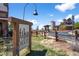 Charming coffee house with outdoor seating, rustic sign, and inviting atmosphere at 12119 S Wanderlust Way, Parker, CO 80138