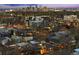 Panoramic aerial view showcasing the Denver skyline and surrounding residential neighborhood at dusk at 3928 Vrain St, Denver, CO 80212