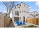 Spacious backyard featuring a patio area with modern seating and a well-maintained fence for privacy at 3928 Vrain St, Denver, CO 80212