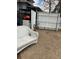 Backyard with white patio furniture with fenced in area at 615 E 49Th Ave, Denver, CO 80216