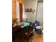 Dining room featuring wooden table and seating at 615 E 49Th Ave, Denver, CO 80216