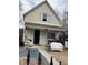 Charming two-story home with a covered front porch and a well-maintained exterior at 615 E 49Th Ave, Denver, CO 80216
