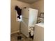 Laundry area with a white refrigerator and white washer at 615 E 49Th Ave, Denver, CO 80216
